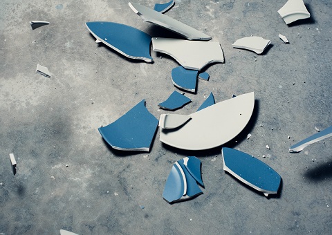 A broken blue plate