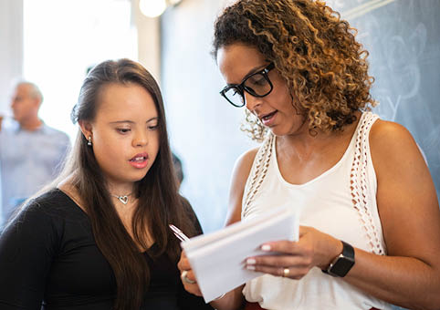Professional speaking to a young person