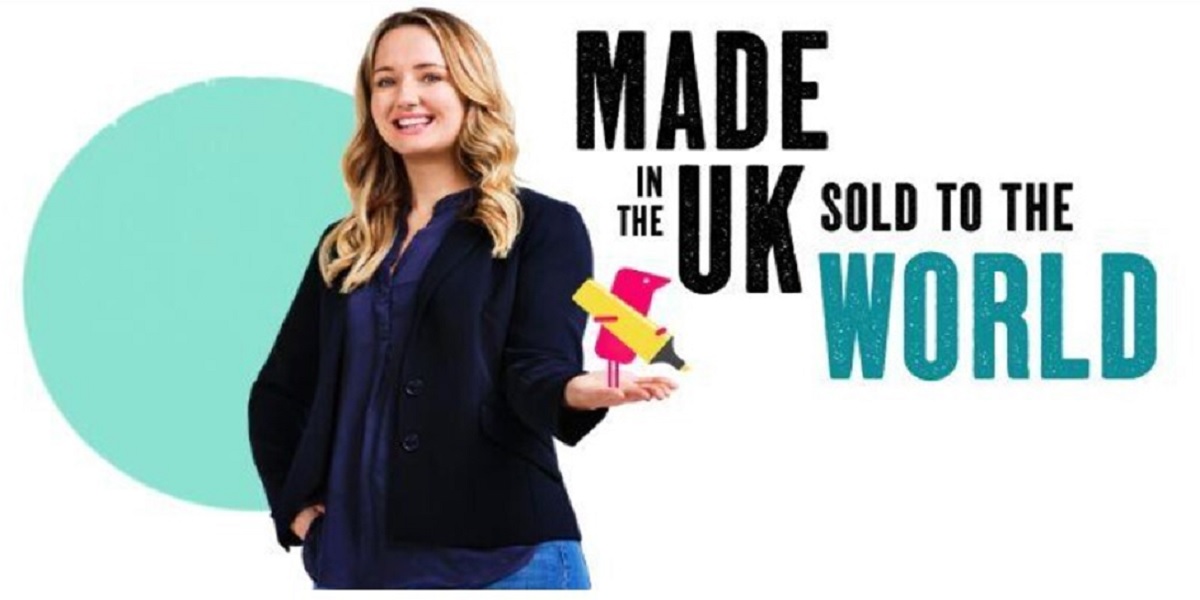 Woman Standing Next To The Words Made In The UK Woman Standing Next To The Words Made In The UK