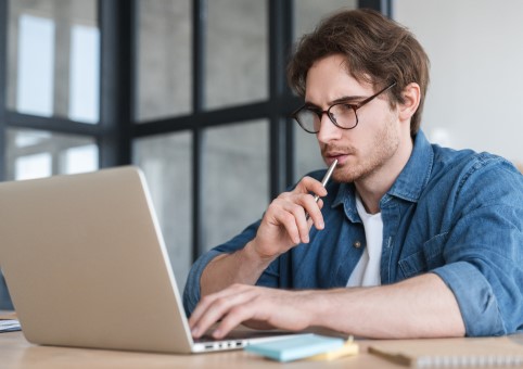 Person looking at a laptop