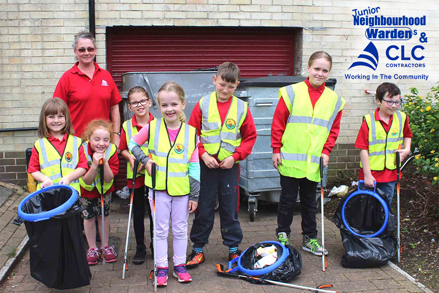 A group of young litter pickers. Text: Junior neighbourhood wardens and CLC contractors, working in the community