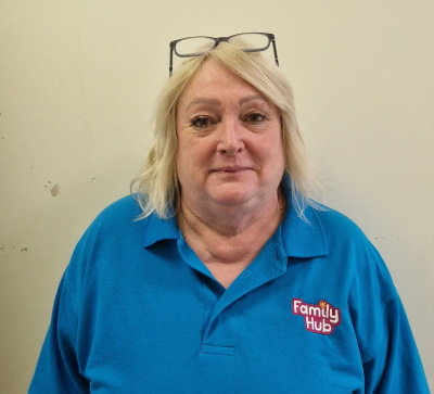 Photograph of Julie Powell wearing her Family Hub uniform