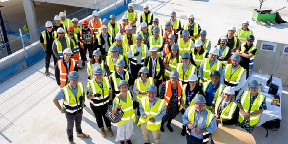 Group Of People Wearing Hard Hats