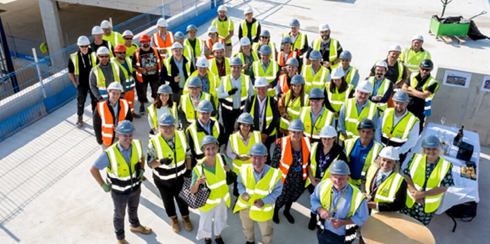 Group Of People Wearing Hard Hats Group Of People Wearing Hard Hats